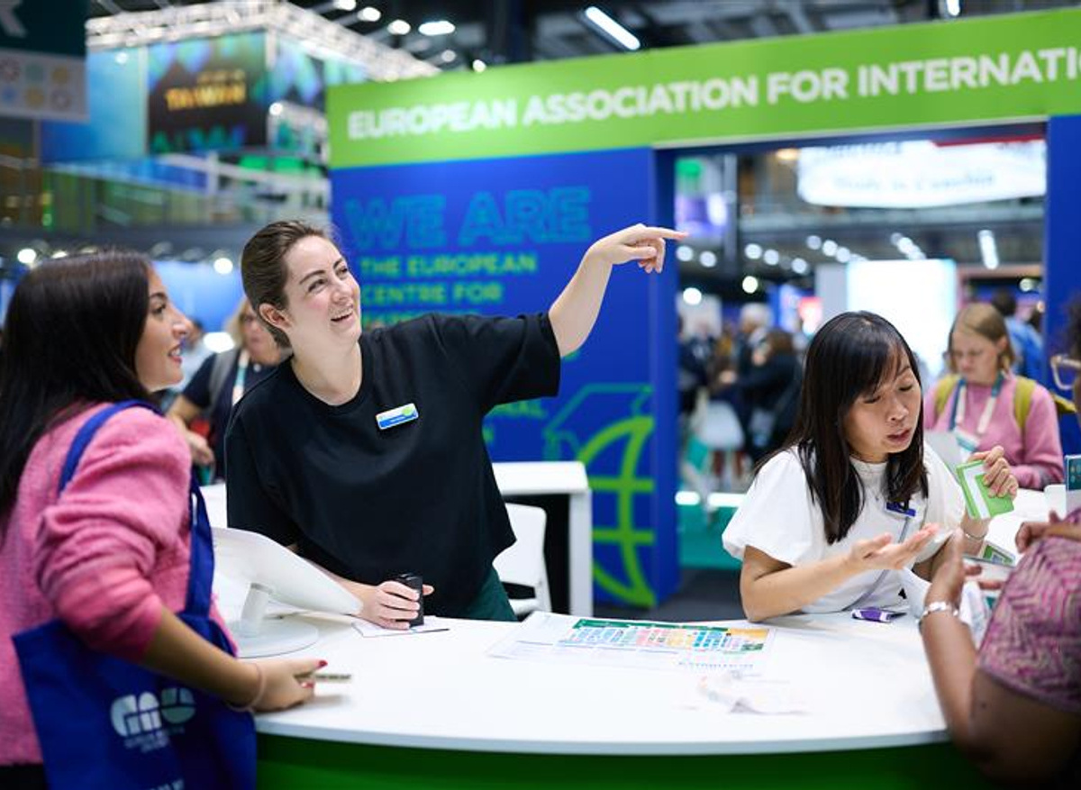 Participants visit the EAIE stand 